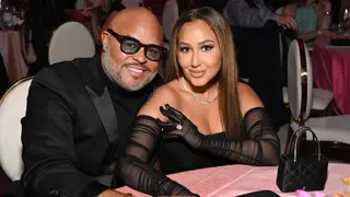 Israel Houghton and Adrienne Bailon attend the Elton John AIDS Foundation's 30th Annual Academy Awards Viewing Party on March 27, 2022 in West Hollywood, California. 