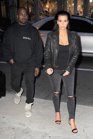 Newlyweds - Kim Kardashian and Kanye West&nbsp;in coordinating ash denim hang at Chelsea Piers in New York City as the pair prepare to celebrate their one-year wedding anniversary in just a few weeks.&nbsp;(Photo: PacificCoastNews)