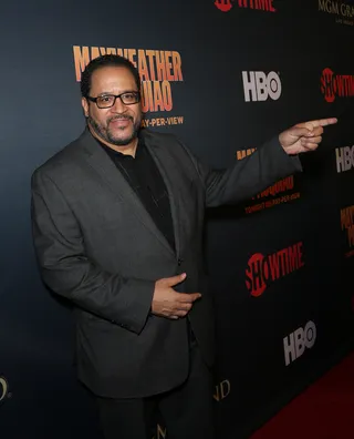 This Way... That-a Way - Michael Eric Dyson&nbsp;gives directions to a pre-fight party.  (Photo: FilmMagic/FilmMagic)
