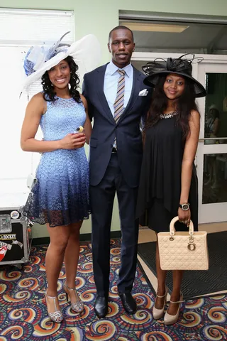 Gorgui and Friends - Senegalese basketball player Gorgui Dieng arrives with two beautiful dates.  (Photo: Robin Marchant/Getty Images for Churchill Downs)