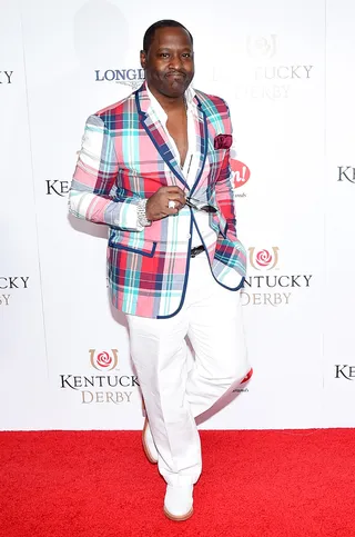 Check It - New Edition's Johnny Gill makes a bold statement with his multicolored checkered jacket.  (Photo: Michael Loccisano/Getty Images for Churchill Downs)