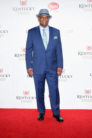 Dapper in Blue - Former football great Warren Moon is dressed for the part in a cut-to-fit blue suit. (Photo: Michael Loccisano/Getty Images for Churchill Downs)