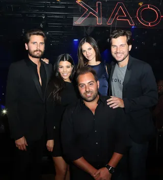 The Lord and Lady of Las Vegas - Reality stars Scott Disick and Kourtney Kardashian party at 1OAK with a group of pals. (Photo: Gabe Ginsberg/WireImage)