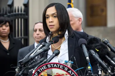 Young and Ambitious - Mosby is 35 years old and the youngest chief prosecutor in any major city in the nation. She's had a long family history of police involvement. (Photo: Andrew Burton/Getty Images)