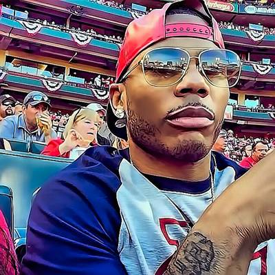 Smooth Operator - Nelly gets ready for baseball season. (Photo: Derrtymo via Instagram)