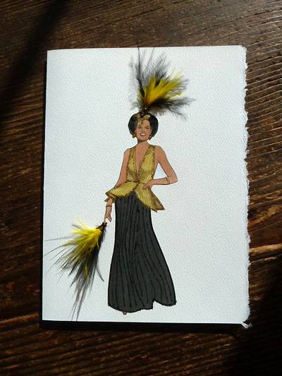 Claudia Creates - Stun your fashion-forward mommy with a gorgeous handmade pick, like this one, which illustrates a 1974 outfit in all its glory. Feathers, glitter and rhinestones&nbsp;not optional.&nbsp;  (Photo: Claudia Creates via Etsy)