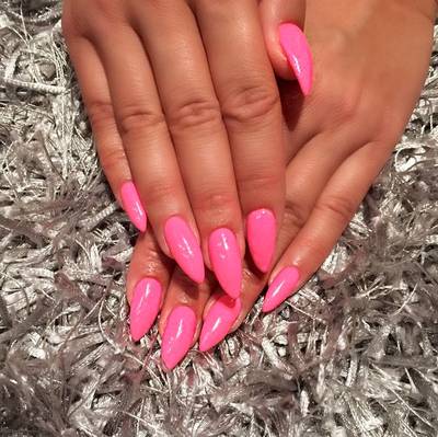 Amber Rose - The combination of a talon-like shape and electric pink hue is unbeatable for summer.(Photo: Amber Rose via Instagram)