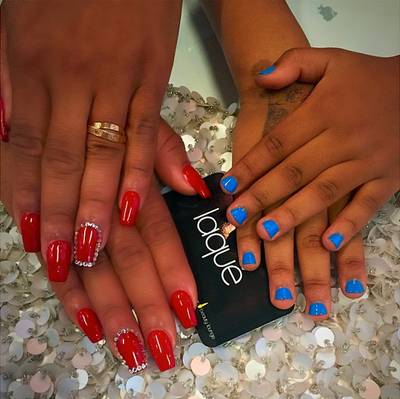 Christina Milian - It’s mommy-daughter day in the Milian household! We can’t decide which we love more: mommy’s red, diamond-accented look or daughter Violet’s cool blue hue. (Photo: Christina Milian via Instagram)