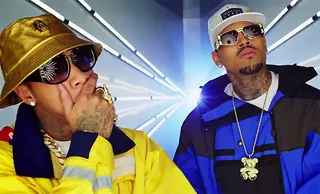 'Ayo' - &quot;Ayo&quot; debuted as the lead single off of the joint project Fan of a Fan: The Album and found&nbsp;Tyga and Chris Brown exchanging bars. The video showcases the two flaunting their riches while riding off in Lambos in a cinematic set. &nbsp;(Photo: RCA Records)