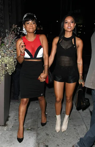 Chris and Kae - Christina Milian and Karrueche Tran enjoy a girls only dinner at Toca Madera in West Hollywood just before hitting up Warwick night club in Hollywood.(Photo: Roshan Perera/SplashNews)