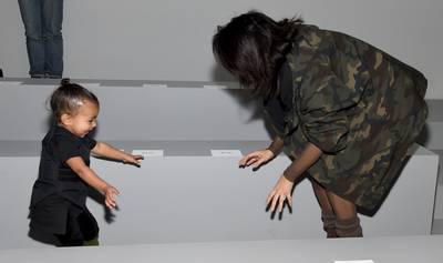 Ninja Bun - At the Adidas Originals x Kanye West fashion show during NYFW Fall 2015, Nori goes ninja — literally, with the bun and all. She's so cute.  (Photo: Dimitrios Kambouris/Getty Images for adidas)