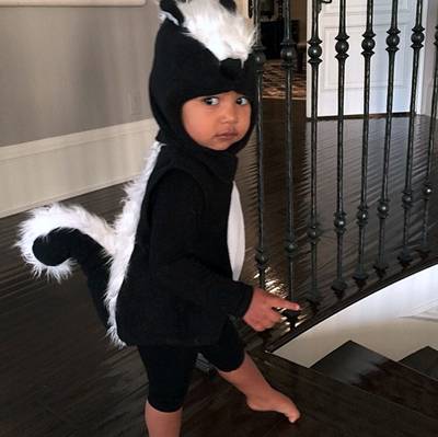 Sneaky Style - This past Halloween,&nbsp;Nori tip-toed around the house in her skunk costume. Isn't she a stinker?!  (Photo: Kim Kardashian via Instagram)