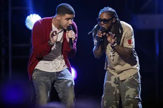 A Young Money Mastermind - Lil Wayne signed Drake to Young Money after seeing the artist's potential in hip hop, R&B and even as a songwriter. In a recent interview, Wayne said that Drake was a better artist than he was. "This kid has the actual R&B presence. He’s one of the dopest lyricists," Wayne said.(Photo: Vince Bucci/PictureGroup)