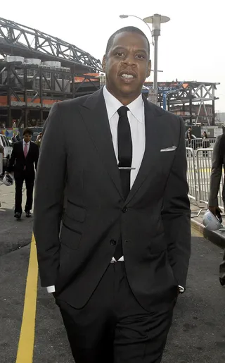 Suited - He was snapped in this slick single-breasted jacket at a Brooklyn Nets press conference. We’re convinced that he’s addicted to the Tom Ford cut.&nbsp;   (Photo: AP Photo/Kathy Willens)