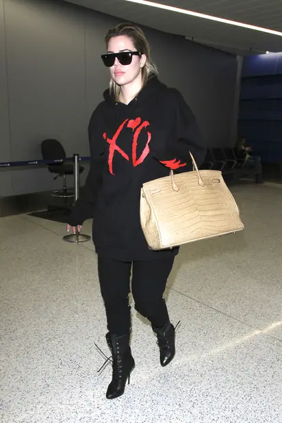 timberland boots Khloe Kardashian wearing  Hermes Birkin Bag