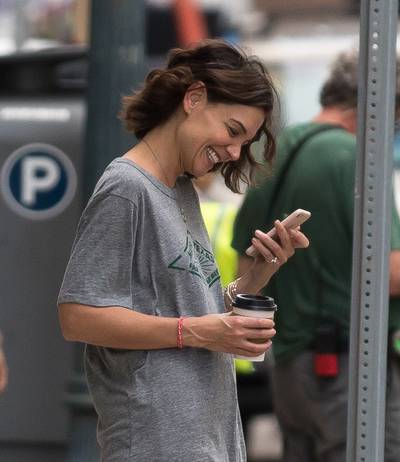 Katie Holmes - Now that Jamie Foxx and his boo Katie Holmes&nbsp;finally out and proud, do we hear wedding bells in the near future? Katie was spotted walking around New Orleans with a big smile while wearing a diamond ring on her left pinky. Do you think she was wearing it on her pinky to throw people off the engagement trail? (Photo: Splash News)