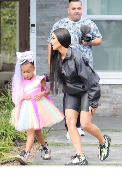 Nori Siwa - North West continues to make money moves as she's seen leaving kids preformer JoJo Siwa's house. The entertainer, who recently celebrated T.I. and Tiny's Harris' daughter's, Heiress, 3rd birthday party, announced that North and Kim Kardashian would be featured in her upcoming music video. In true JoJo Siwa fashion, Nori sported a colorful look including a rainbow tutu dress with a matching extensions ponytail, a hair bow, and a pair of Doc Martens. (Photo: Backgrid)