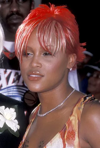 Eve - Who’s that girl? You can’t miss the rapper, who flaunted her then-signature red pixie with platinum highlights at the inaugural BET Awards in 2001.  (Photo: Ron Galella, Ltd./WireImage)&nbsp;