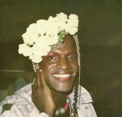 Marsha P. Johnson - From the '60s to the '90s, American transgender rights activist Marsha P. Johnson was known as an immensely popular figure in New York City's gay and art scene. Johnson exercised her passion for transgender rights by spearheading the Stonewall Riots, where she often clashed with the police. Furthermore, she was known as one of the city's most infmaous drag queens, and co-founded Street Transvestite Action Revolutionaries (S.T.A.R.) with fellow trans woman Sylvia Rivera. Tragically, in July 1992, shortly after the 1992&nbsp;Pride March, Johnson's body was found floating in the&nbsp;Hudson River&nbsp;off the West Village Piers. Though police initially ruled her death a suicide, her peers insisted she wasn't suicidal and protested until police reopened the case as a possible homicide.(Photo: Pay It No Mind/Redux Pictures)