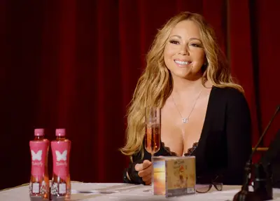 Mariah Carey for Go N'Syde - While Jay Z has his 40/40 drink marketed towards sports-loving males, Mariah Carey and Kevin Liles created a special Go N'Syde for the ladies. Fittingly, Mimi's drink is called &quot;Butterfly&quot; and comes in a cute pink bottle. Each bottle retails for $1.99 at Duane Reade and Walgreens, and both she and Jay have a special endorsement that earns them profit on every bottle sold.(Photo: Ivan Nikolov/WENN.com)