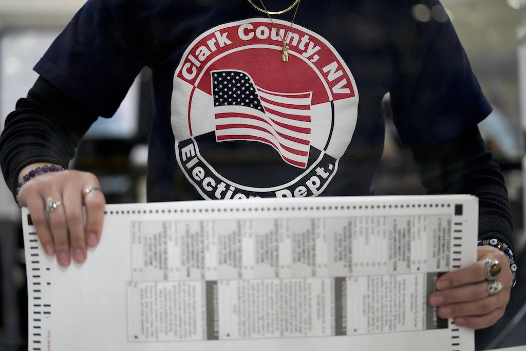 person holding ballot