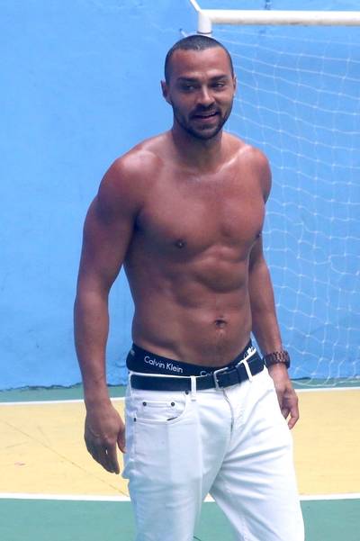 Jesse Williams - The actor/activist shows off a VERY appetizing dad bod while playing soccer with children in Rio De Janeiro, Brazil. Even when he's away from his own kids, he's on (hot) dad duty!&nbsp;(Photo: Gade/Backgrid)
