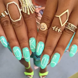 Angela Simmons - A blue-green hue and layers of gold bling are all Angie needs to solidify her rock star status.   (Photo: Angela Simmons via Instagram)