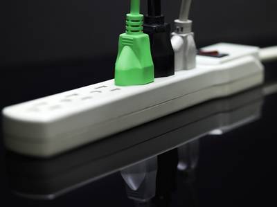 Use Power Strips - They make it easy to quickly shut down things that you?re not using, especially overnight. These are key for things that draw lots of power on standby, like televisions and video game consoles. Plus, a strip with a surge protector will protect your stuff from energy surges.   (Photo: Chat Roberts/Corbis)