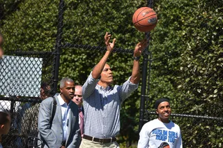 Score? - The president never misses an opportunity to play hoops at the Easter Egg Roll.(Photo: MANDEL NGAN/AFP/Getty Images)