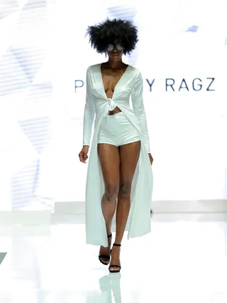 Summertime Fly - Can’t you picture yourself poolside in this ivory twist-front robe and matching hot shorts?  (Photo: Chelsea Lauren/BET/Getty Images for BET)