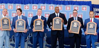 Frank Thomas, Joe Torre Headline Hall of Fame Class - Frank Thomas headlined a 2014 Baseball Hall of Fame class, which included managers Joe Torre, Tony La Russa and Bobby Cox, and pitchers Tom Glavine and Greg Maddux. &quot;I'm speechless. Thanks for having me in your club,&quot; said Thomas, who finished his 19-year career with 521 home runs and 1,704 RBIs, reported the Associated Press. Torre, who managed the New York Yankees to four World Series titles,&nbsp;gave a moving speech, although he apologized afterward for forgetting to include late Yankees owner George Steinbrenner and his family in it.&nbsp;(Photo: Jim McIsaac/Getty Images)