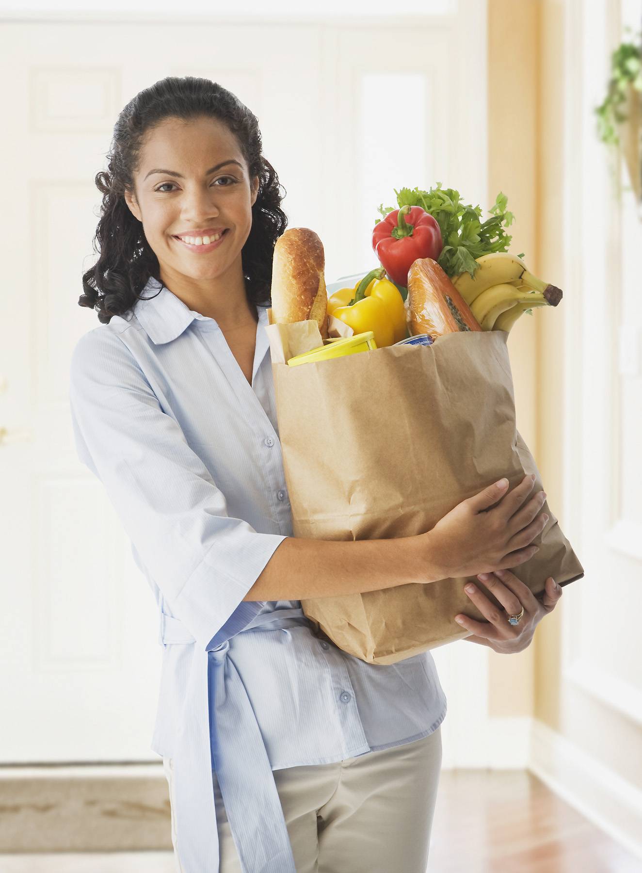 woman holding groceries
