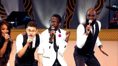 Getting Into It - Tye Tribbett really gets into his performance on the Apollo Live stage.   (Photo: BET)