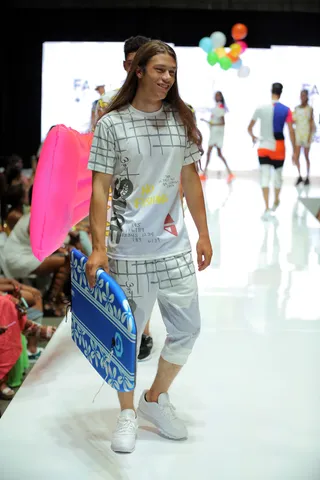 Surf’s Up - Boardshorts get a modern update thanks to a cool graphic print and a matching T-shirt to go with them. Don’t forget the crisp white sneaks!  (Photo: Chelsea Lauren/BET/Getty Images for BET)