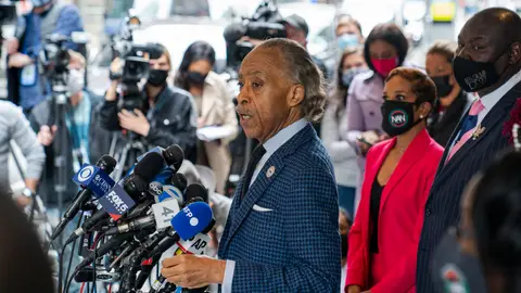 NEW YORK, NEW YORK - APRIL 14: The Rev. Al Sharpton is joined by attorney Ben Crump (R) and numerous members of the Mothers of the Movement at a news conference to comment on the George Floyd and Daunte Wright cases on April 14, 2021 in New York City. Crump is the attorney for the family of Daunte Wright, who was shot and killed Sunday after being pulled over during a traffic stop in Brooklyn Center, Minnesota. (Photo by Robert Nickelsberg/Getty Images)