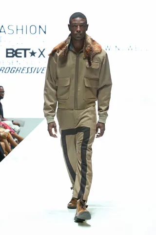 Fashion Forward - A luxe fur collar and graphic line detail along the pant legs give this clean khakis look some modern edge.  (Photo: Jesse Grant/BET/Getty Images for BET)