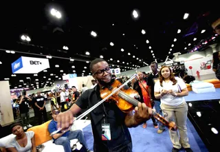 SHOW ME WHAT YOU GOT - A violin took the floor for a mini-show at the 2015 BET Experience at the Los Angeles Convention Center. (Photo: Tommaso Boddi/Getty Images for BET)