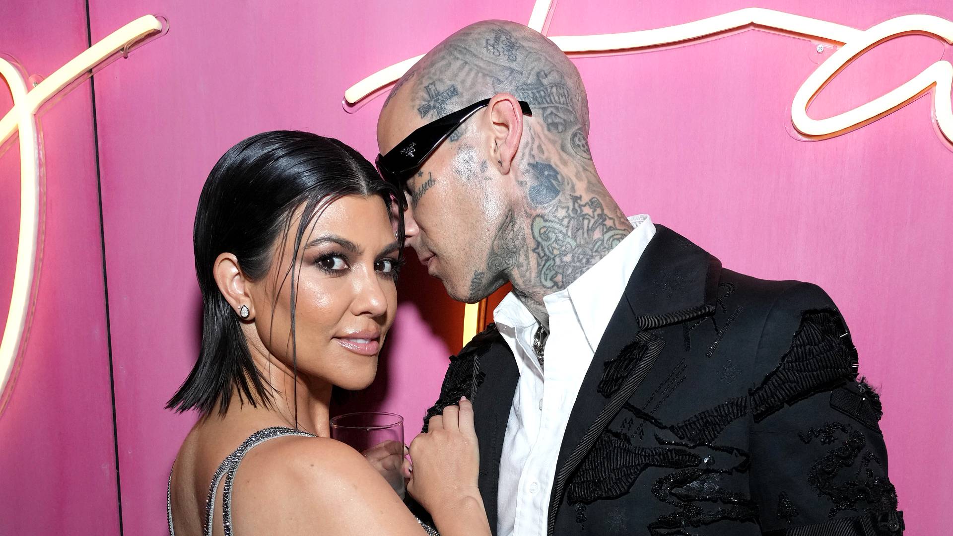 Kourtney Kardashian and Travis Barker attend the 2022 Vanity Fair Oscar Party hosted by Radhika Jones at Wallis Annenberg Center for the Performing Arts on March 27, 2022 in Beverly Hills, California. 