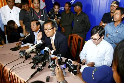 Cambodian Opposition Party Cries Election Fraud - Cambodia’s long-serving Prime Minister Hun Sen won a reelection after voting was held on Sunday, but the opposition party is alleging widespread voting fraud and calling for an investigation. The party and opposition leader Sam Rainsy made claims of removable ink, used ballots and an electoral list missing at least 1.3 million voters’ names.(Photo: Heng Sinith/AP Photo)
