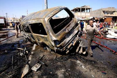 Deadly Wave of Iraq Car Bombs Kills Dozens - More than a dozen coordinated car bombs were detonated in mainly Shia neighborhoods near Iraq?s capital, Baghdad, on Monday morning. Reports of the estimated death toll have varied, with Reuters reporting at least 60 deaths and Al-Jazeera reporting 33. The clashing between the country?s Kurds, Shia and Sunni Muslim groups have led to more than 810 deaths in July, reported Al-Jazeera.(Photo:Nabil al-Jurani/AP PHOTO)