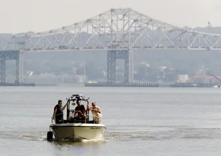 Speed Boat Carrying Wedding Party Crashes - What was meant to be a joyous occasion turned to mourning on Friday night after a speedboat carrying a wedding party collided with a construction barge along the Hudson River in New York City. Six people were on board and two were killed.&nbsp;(Photo: Julio Cortez/AP Photo)