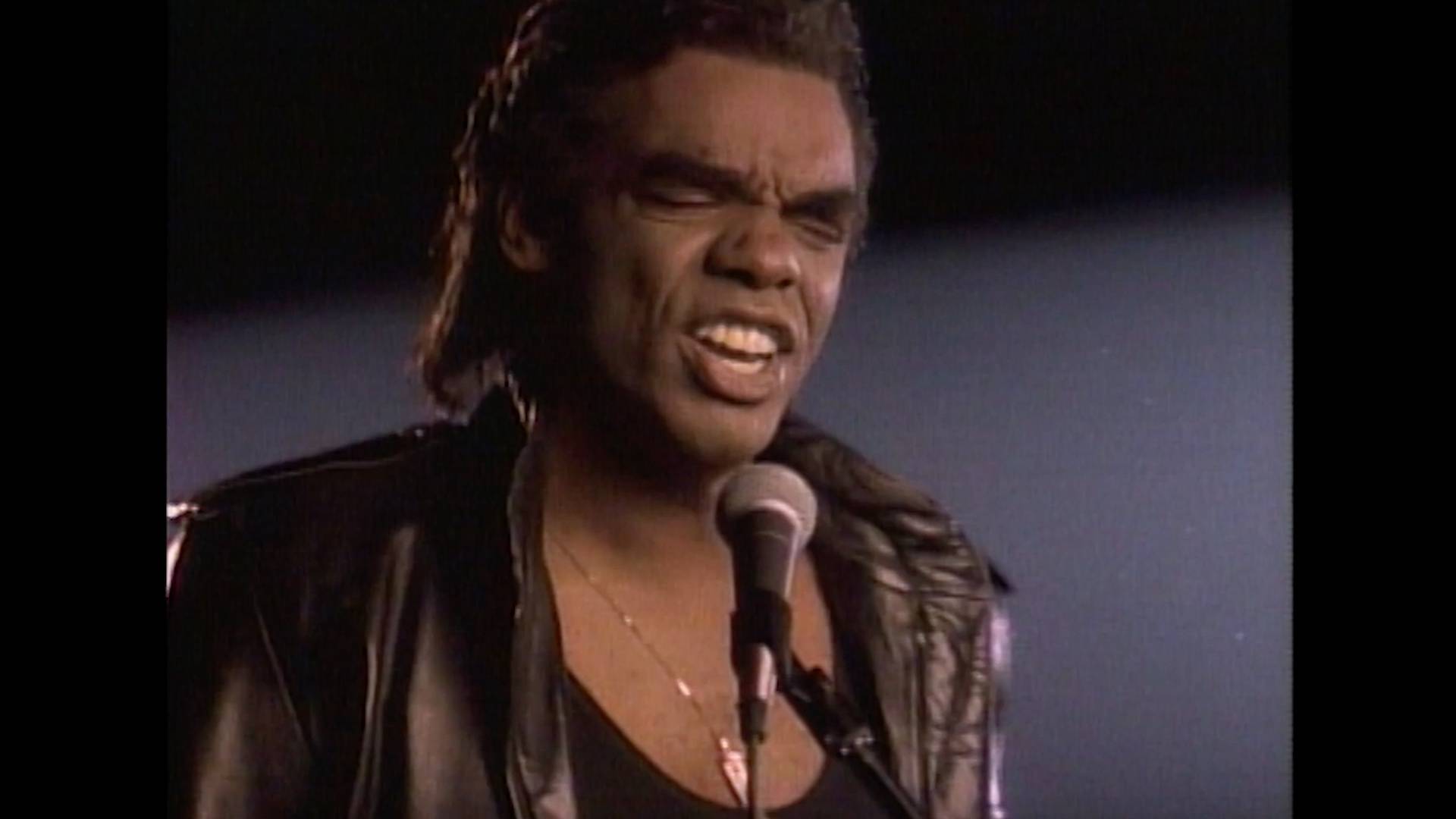 Ron Isley in the "It Takes a Good Woman" music video.