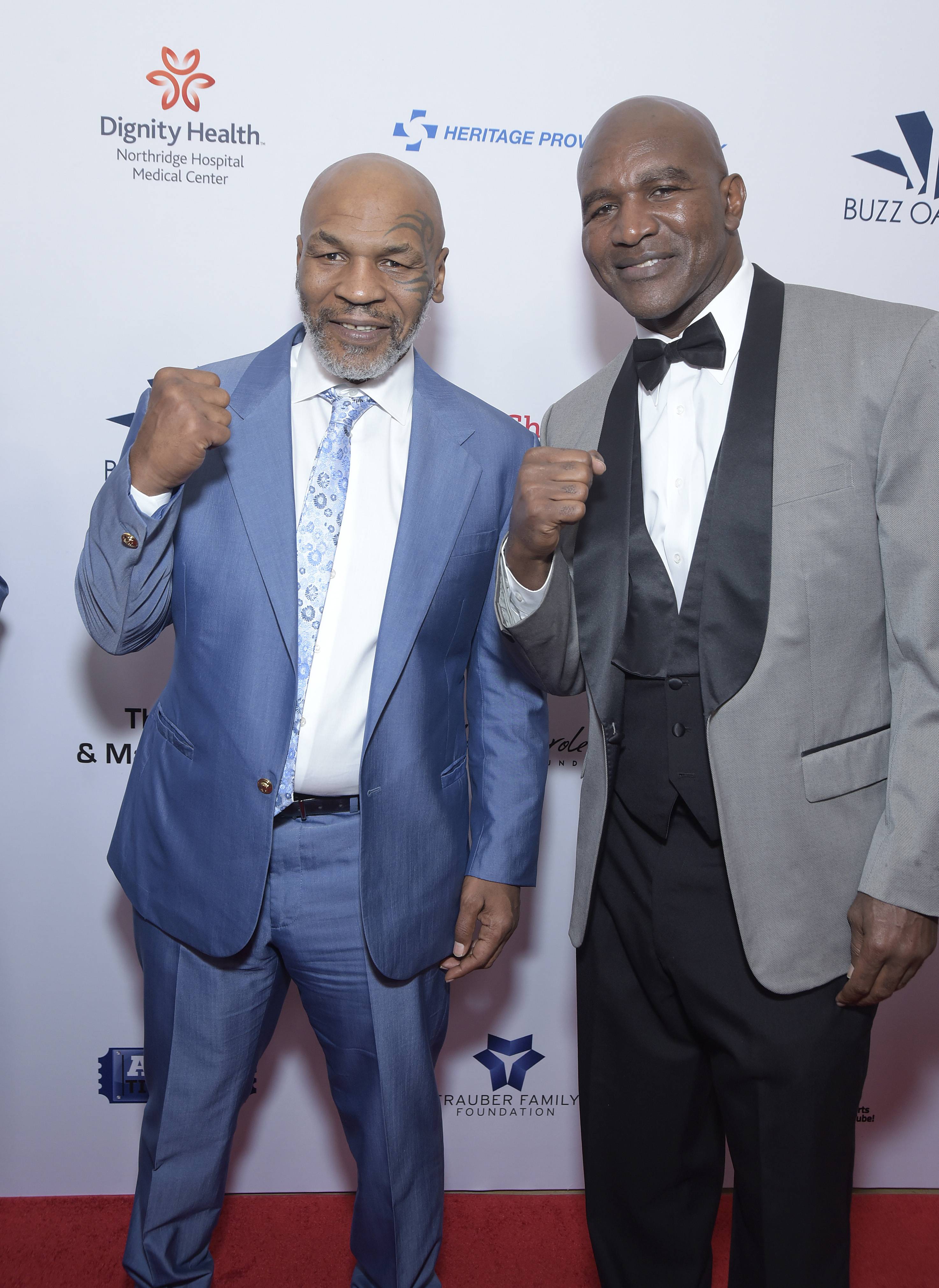 BEVERLY HILLS, CALIFORNIA - AUGUST 09: Heavyweight boxing legends Mike Tyson and Evander Holyfield attend the 19th annual Harold and Carole Pump Foundation Gala at The Beverly Hilton Hotel on August 09, 2019 in Beverly Hills, California. (Photo by Michael Tullberg/Getty Images)