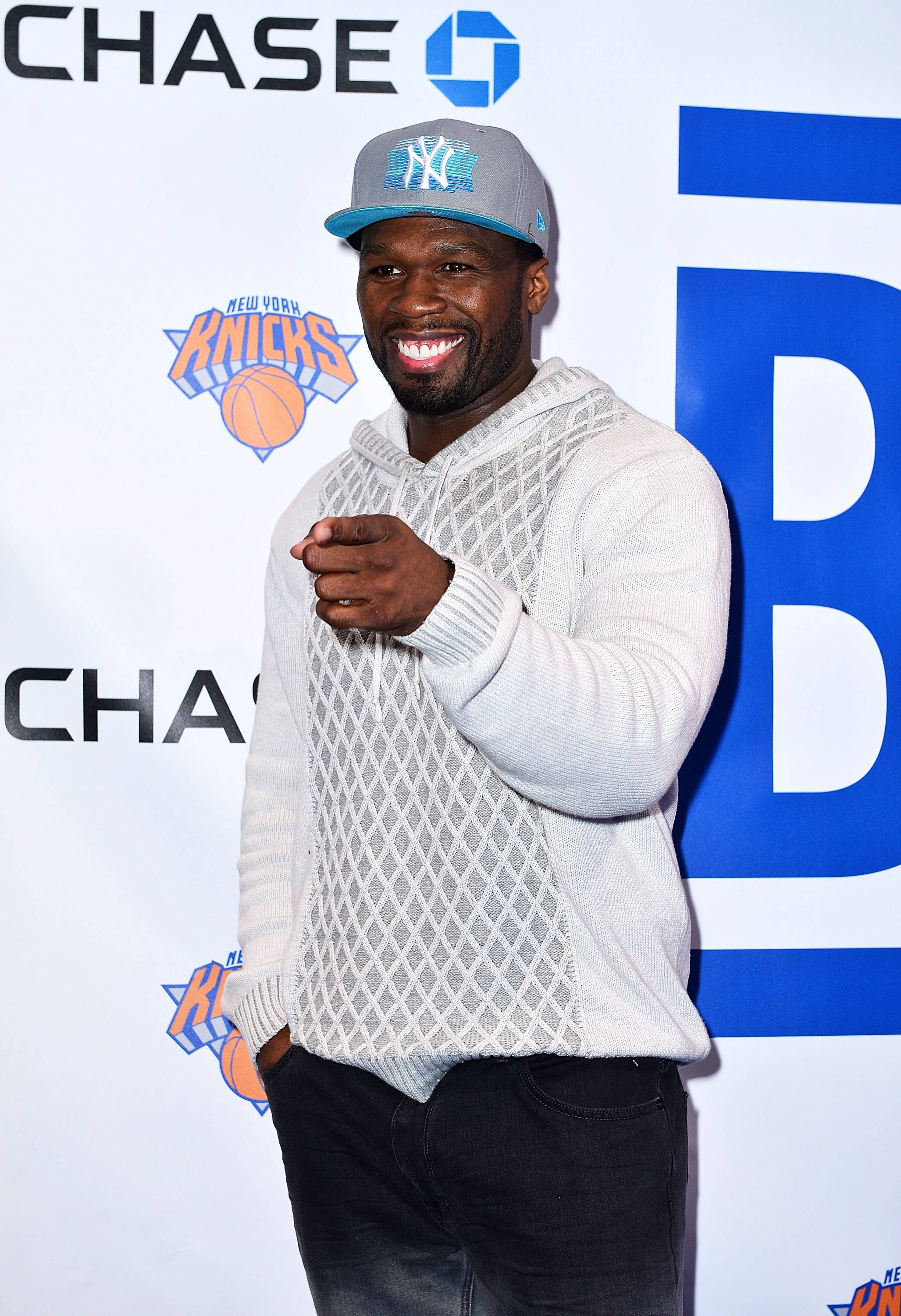 Steve Stoute and 50 Cent Exchange Words at Knicks Game