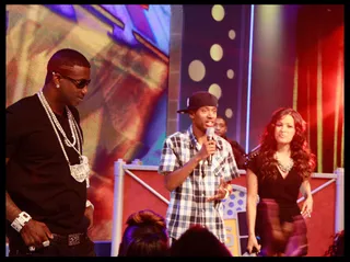 Hosts With The Most - Terrence & Rocsi hop onstage to greet Gucci after his performance. (Photo Credit: Ernest Estime)