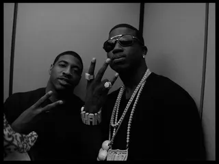 Almost Time - DJ Holiday and Gucci Mane throw on their ice grills for the camera. (Photo Credit: Ernest Estime)