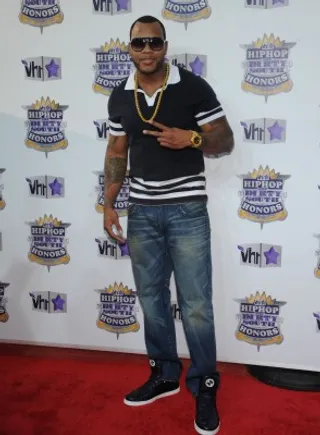 Flo Rida - Flo Rida dressed his stylish black polo shirt with a thick gold chain.&lt;br&gt;&lt;br&gt;(Photo Credit: PictureGroup)