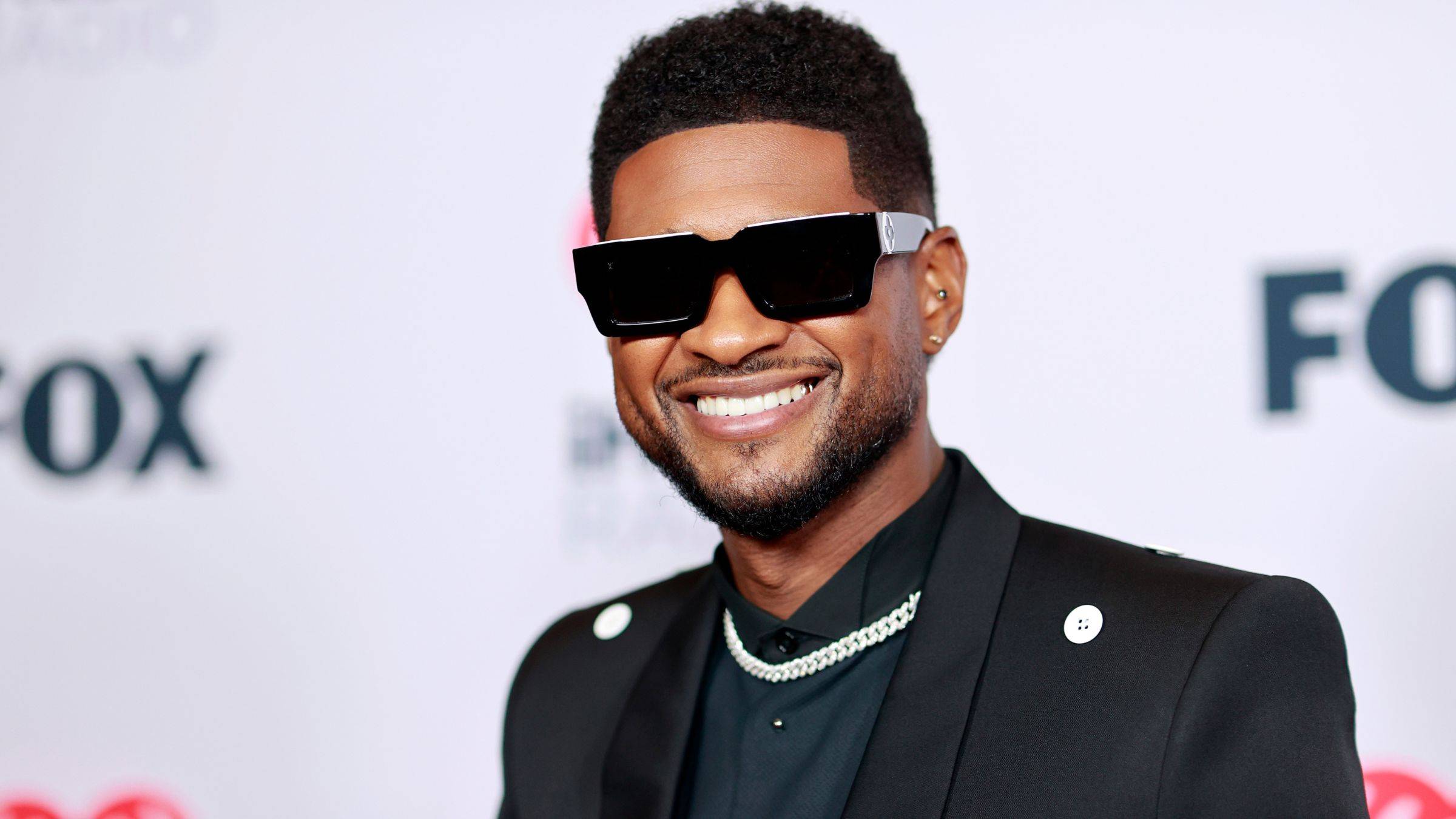 Usher strips for new Skims photos ahead of Super Bowl halftime