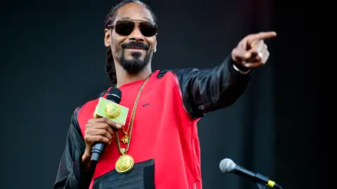 AUSTIN, TX - MARCH 15:  Snoop Dogg performs onstage at the SXSW Outdoor Stage at Butler Park during the 2014 SXSW Music, Film + Interactive Festival at Butler Park on March 15, 2014 in Austin, Texas.  (Photo by Jordan Naylor/Getty Images for SXSW)