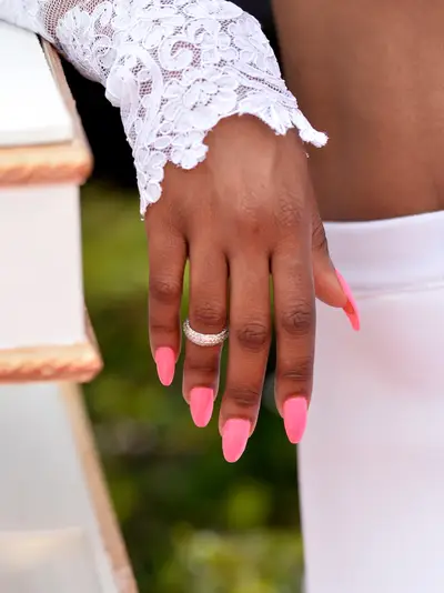 2013: Sevyn Streeter - A “pop of color” goes a long way. Just ask&nbsp;Sevyn Streeter&nbsp;who opted for bright pink nail polish to compliment her all-white ensemble on the big night. (Photo by Alberto Rodriguez/BET/Getty Images for BET) (Photo by Alberto Rodriguez/BET/Getty Images for BET)